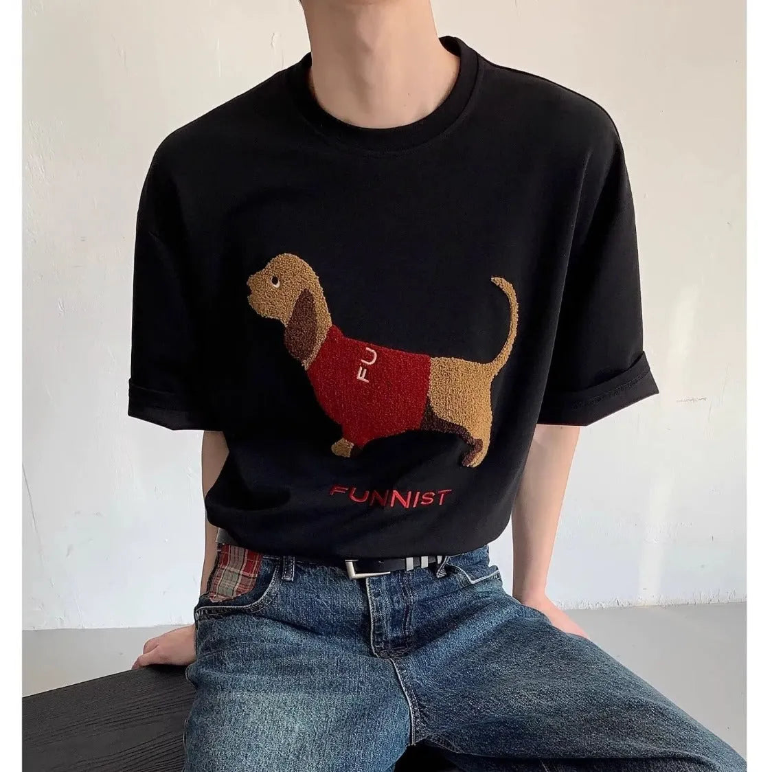 Men's grey cotton T-shirt with embroidered sausage dog holding towel design on front