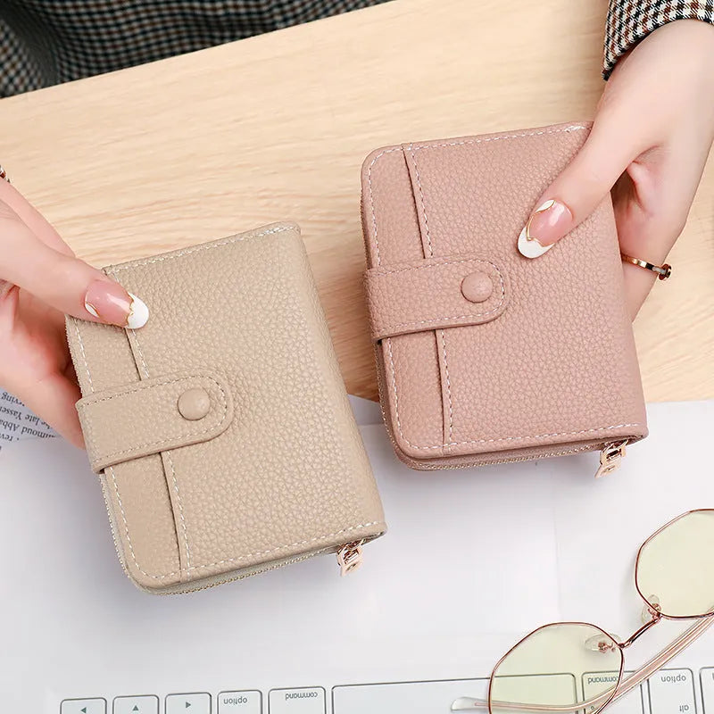 Ladies' short wallet with lychee pattern texture in beige, pink, black, and red colour options