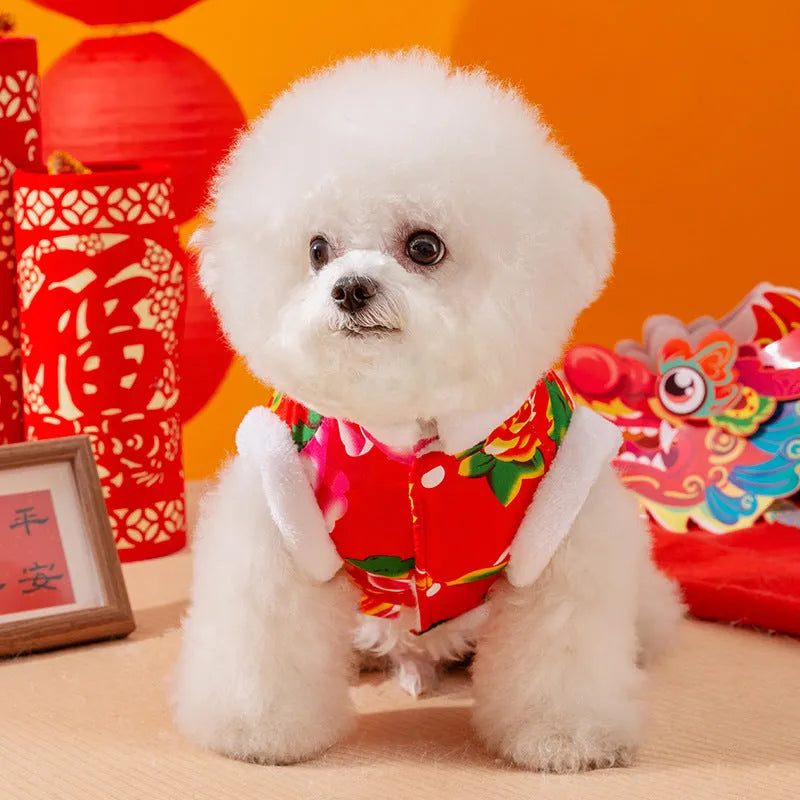 Red winter dog vest with plush lining, metal D-ring, and large floral peony pattern on a small dog