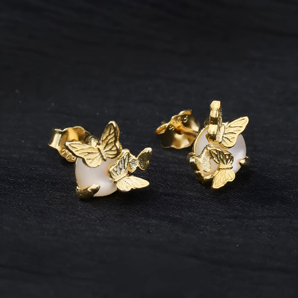 Butterfly ear studs in 925 silver with electroplated white gold or gold colour and original design