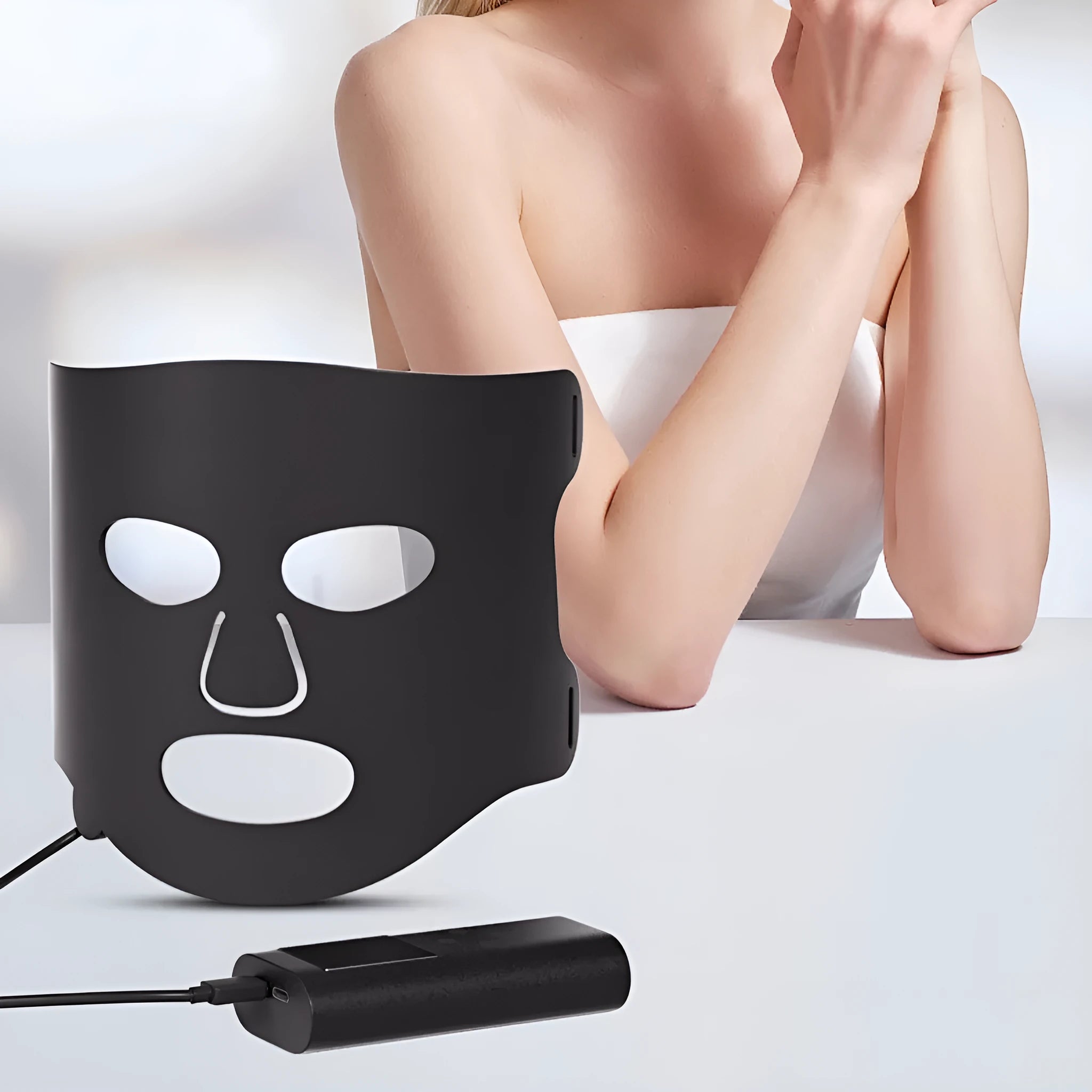Black and gold LED phototherapy face mask with controller and strap for home skin treatment