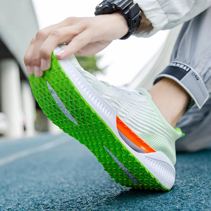 Men's blue casual sports shoes with breathable mesh cloth upper and round toe on a plain background.