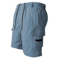 Loose straight-cut casual sports shorts in polyester, shown in khaki colour on a hanger.