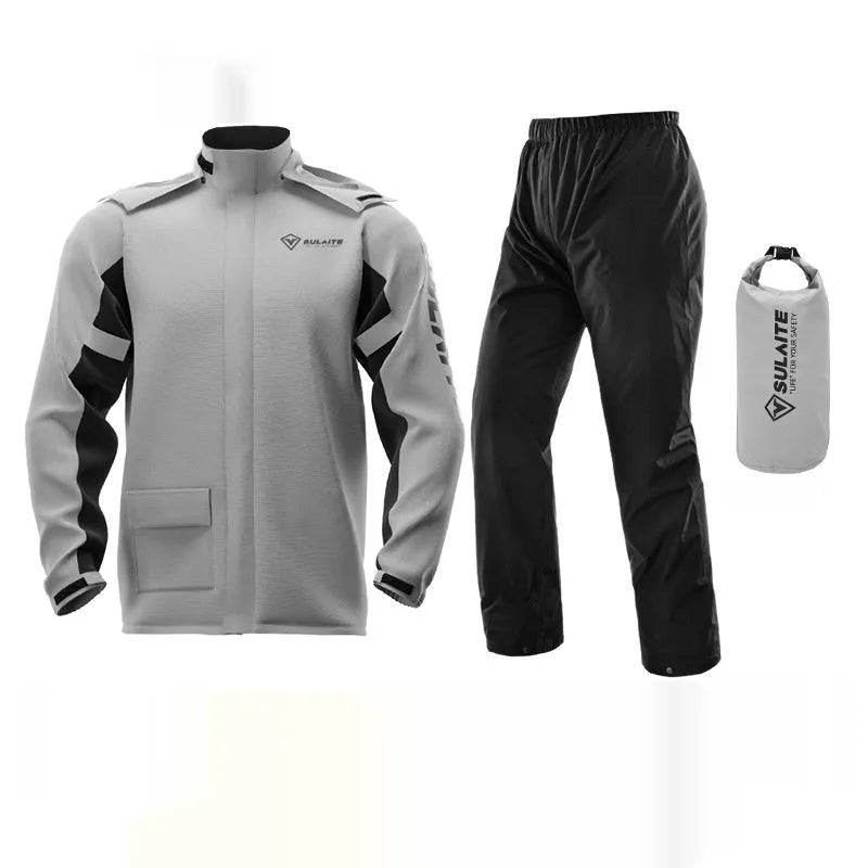 Motorcycle rider wearing a black two-piece waterproof rain suit and shoe covers
