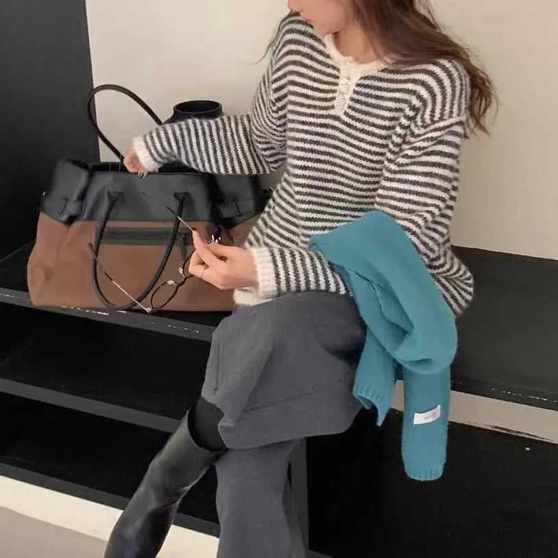 Red and blue striped cashmere pullover sweater for women with plaid pattern and loose fit.