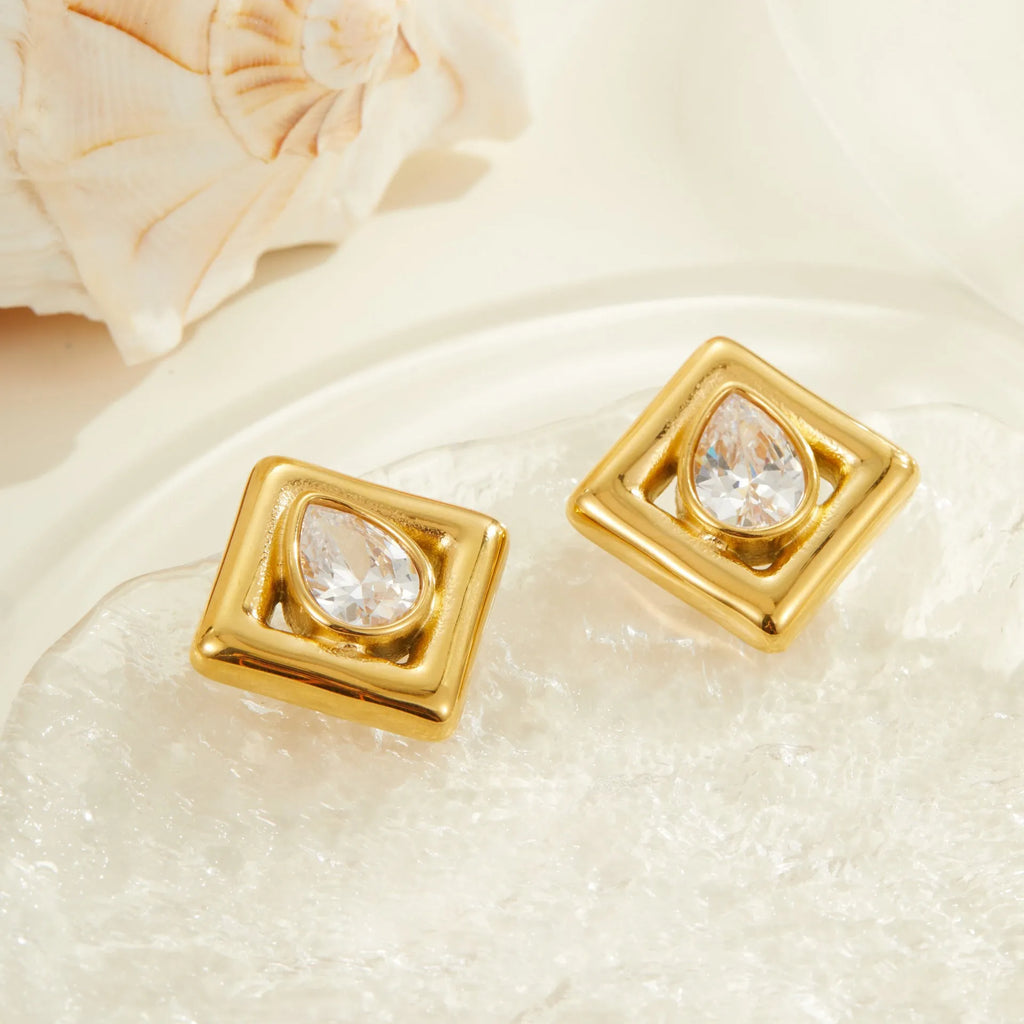 Geometric water drop shaped stud earrings with inlaid zircon stone and gold colour finish