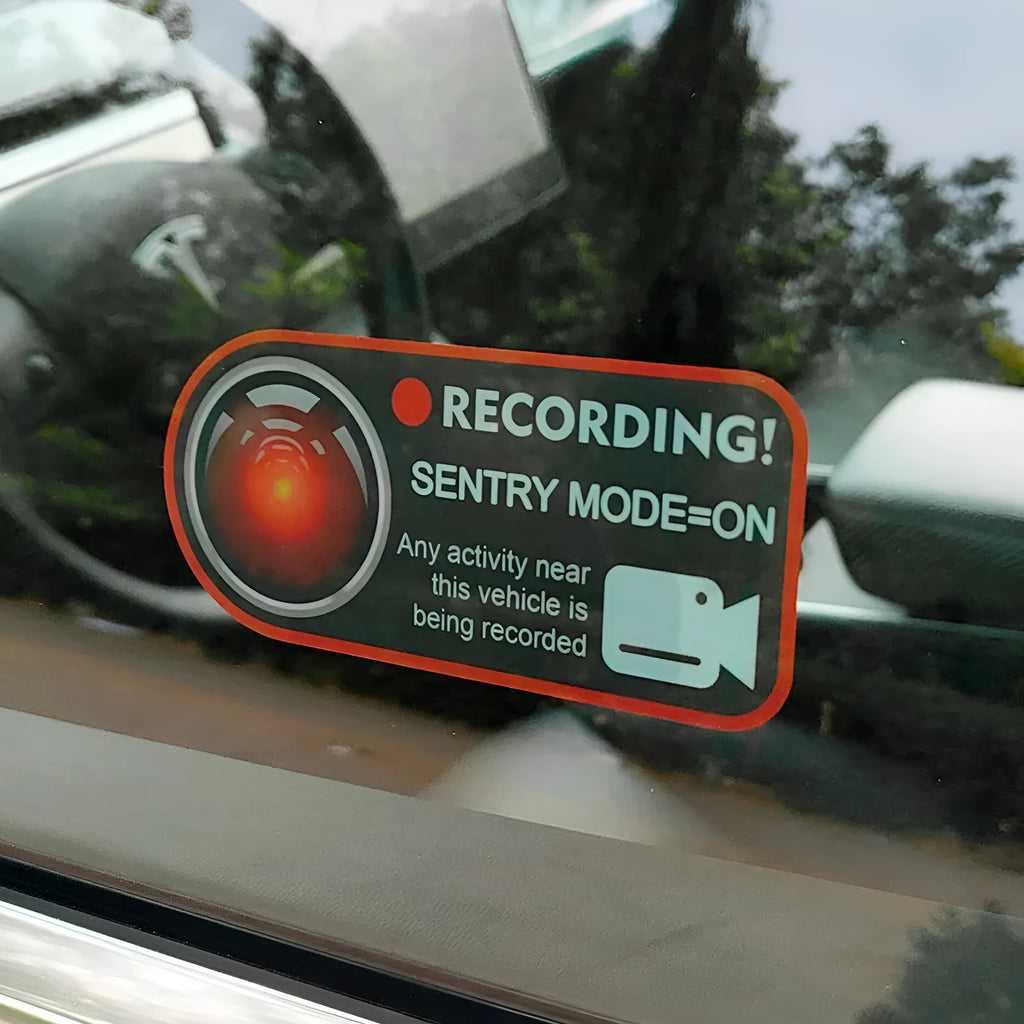 Tesla Sentry Mode warning sticker showing English text on electrostatic PVC material