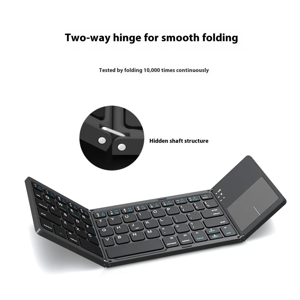 Black tri-fold portable Bluetooth keyboard shown open next to a smartphone, demonstrating its compact size.
