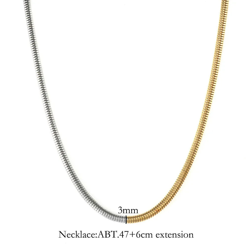 Gold-tone snake bone chain necklace with geometric lines and 3mm thick links