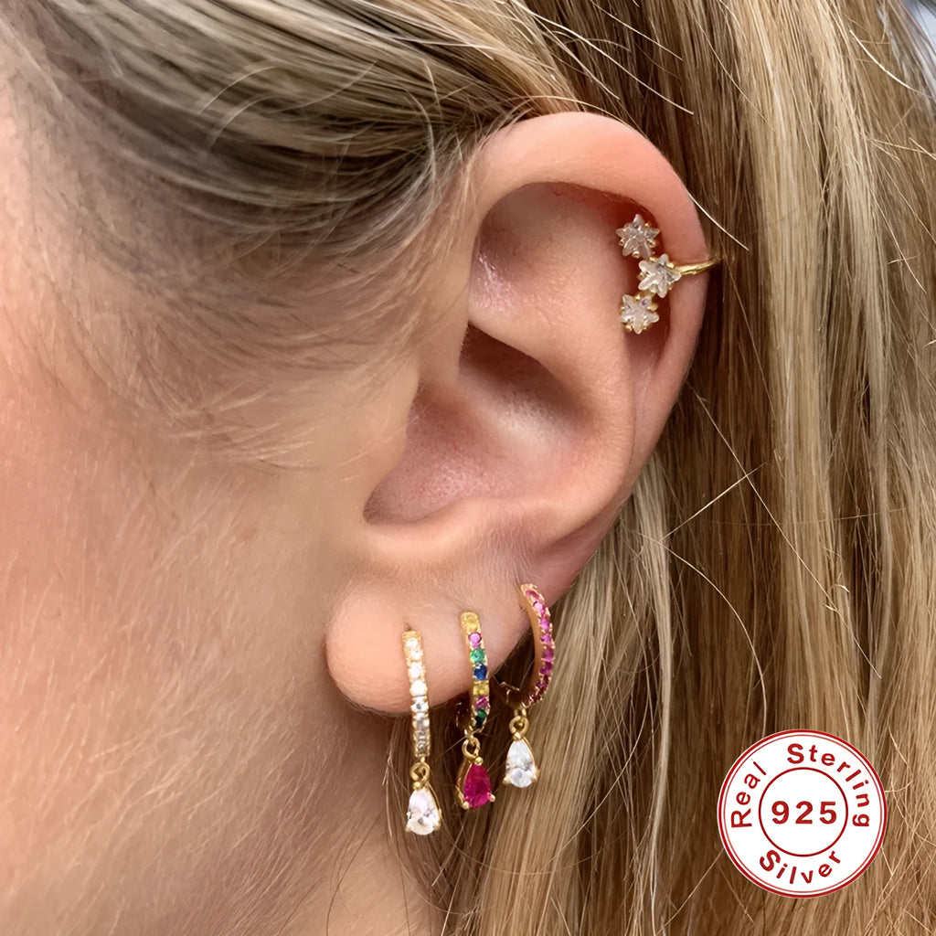 S925 sterling silver water drop shaped earrings with geometric design and stone accents.