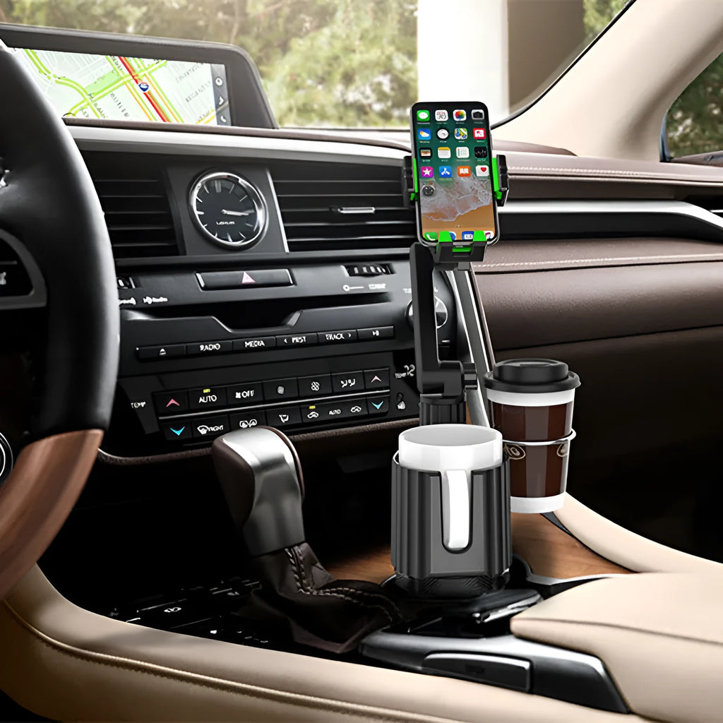 Green car seat holder supporting a kettle and a mobile phone on a grey interior.