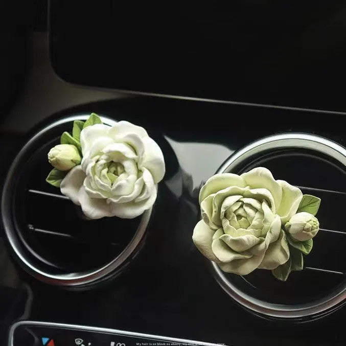 Jasmine scent solid gypsum car air vent perfume clip in beige white or fresh green.