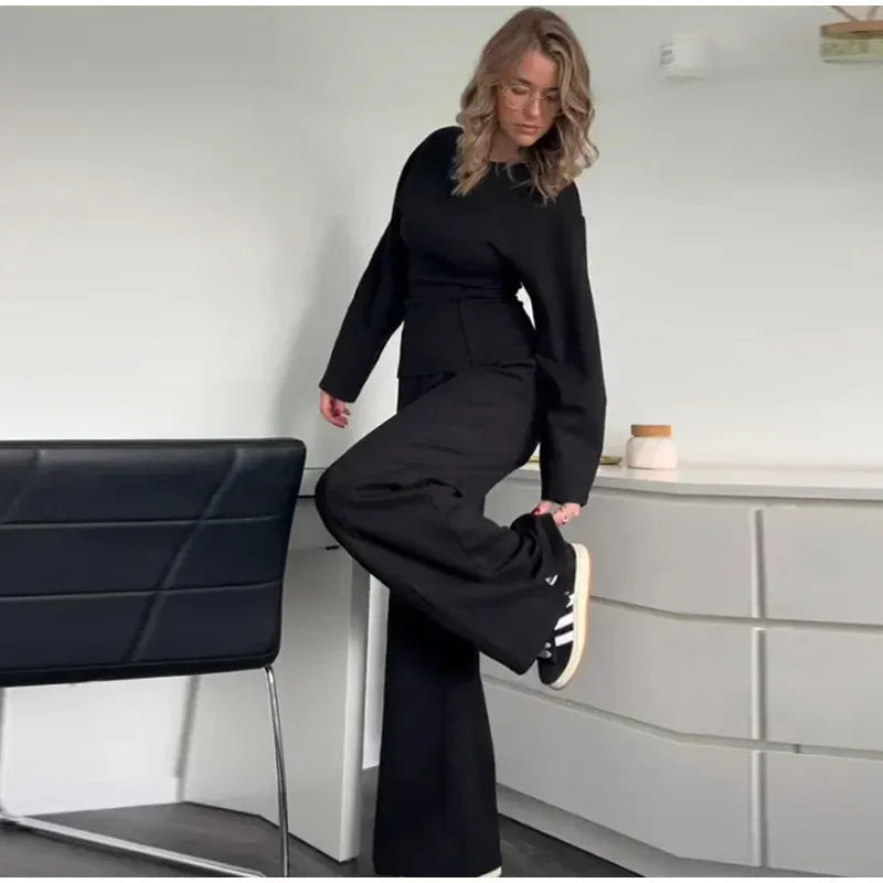 Women's black fleece suit set with O-neck pleated top and wide-leg trousers