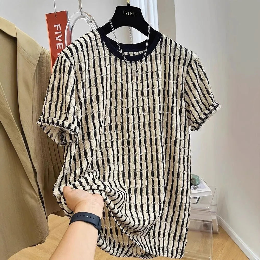 Black men's loose-fitting striped short sleeve pullover top made from silk and linen blend.