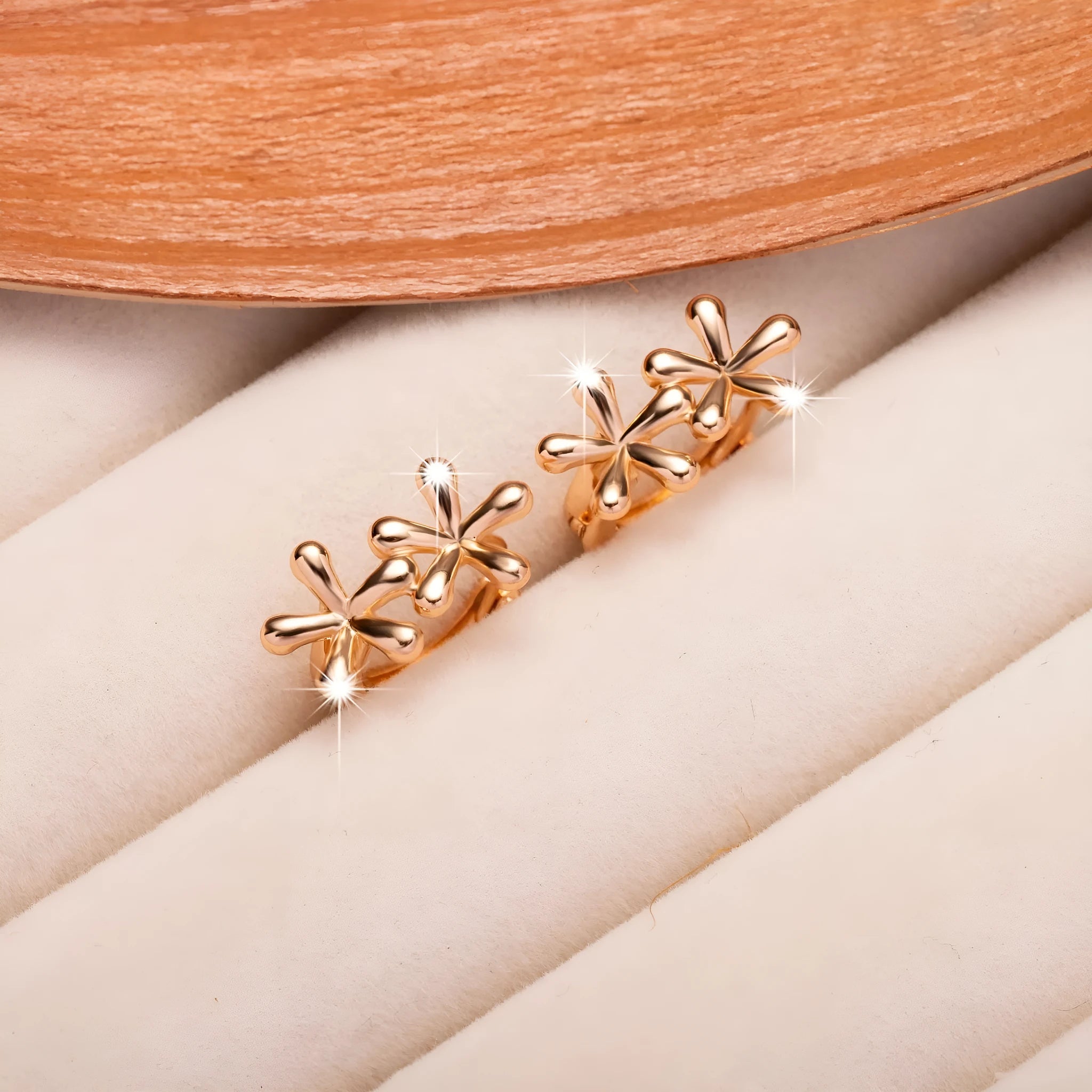Rose gold electroplated circular earrings with waterdrop flower design in European and American style