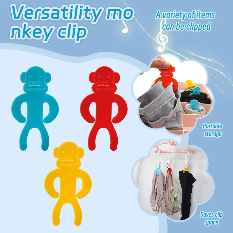 Plastic socks clips in blue, yellow, and red colours for laundry organisation