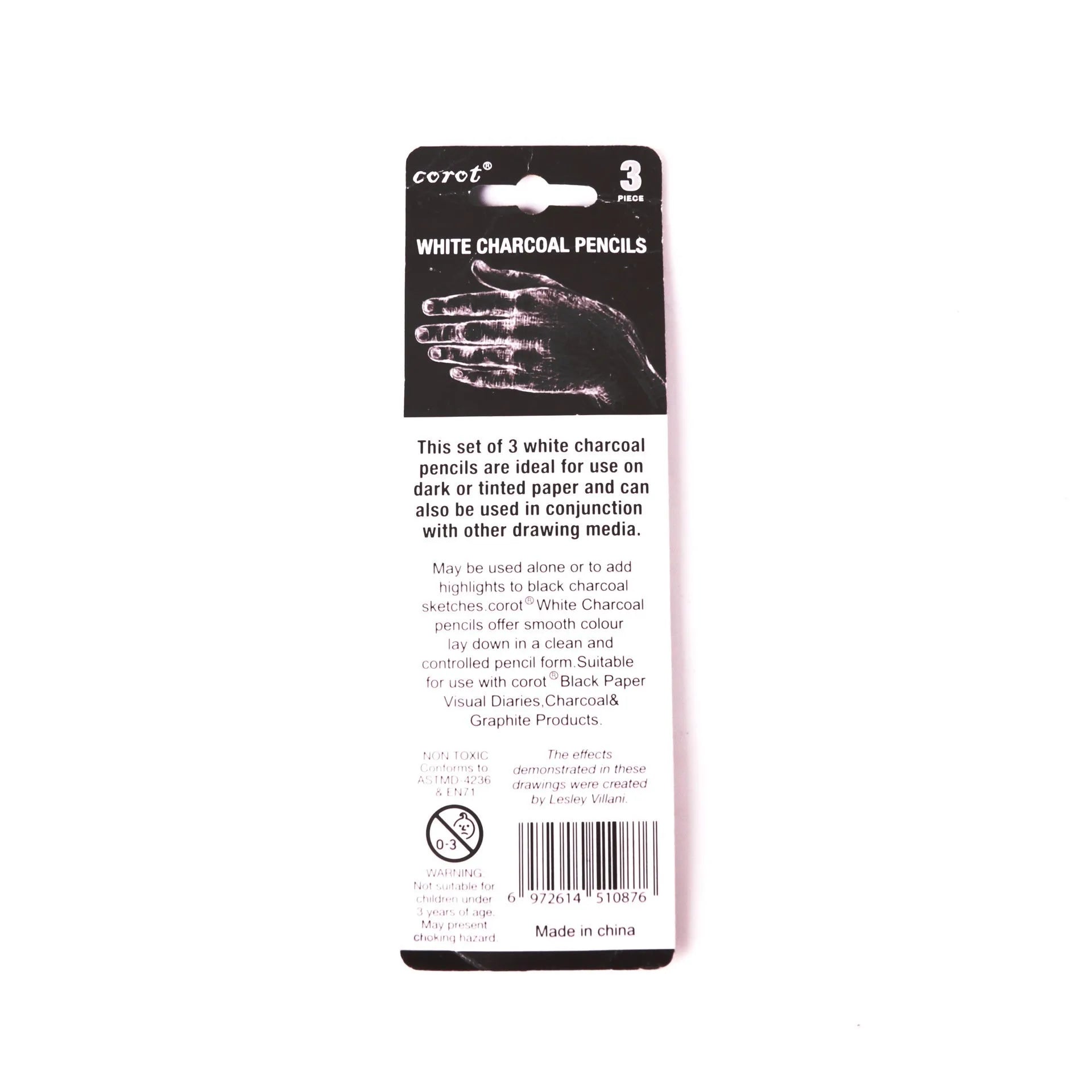 Three white charcoal sketching pencils with wooden casings for highlight work