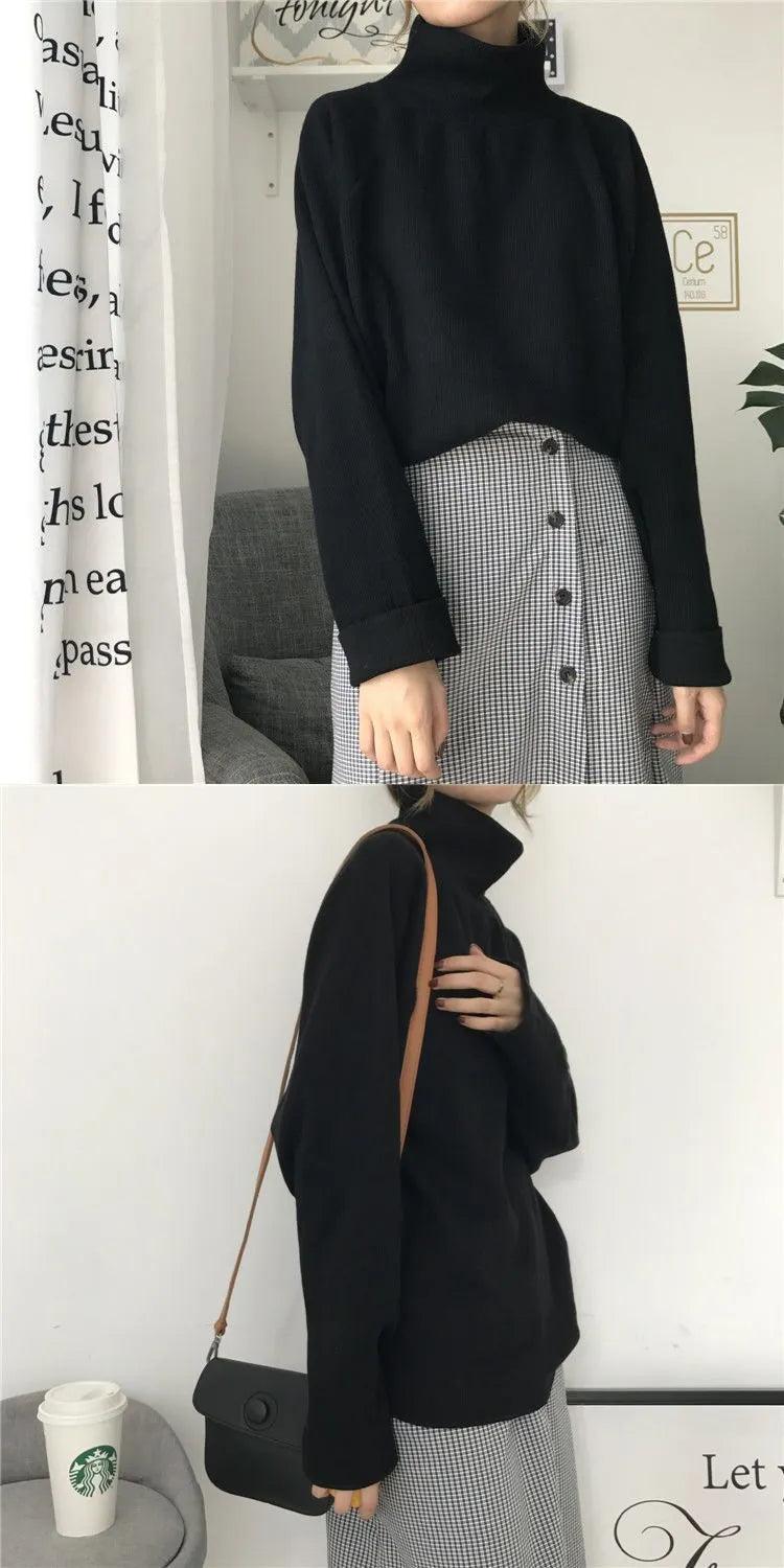 Women's apricot coloured half-high collar long sleeve loose fit casual top on a hanger