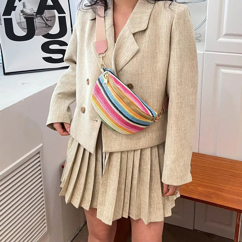 Straw woven beach bag with single shoulder strap and internal zipper compartment