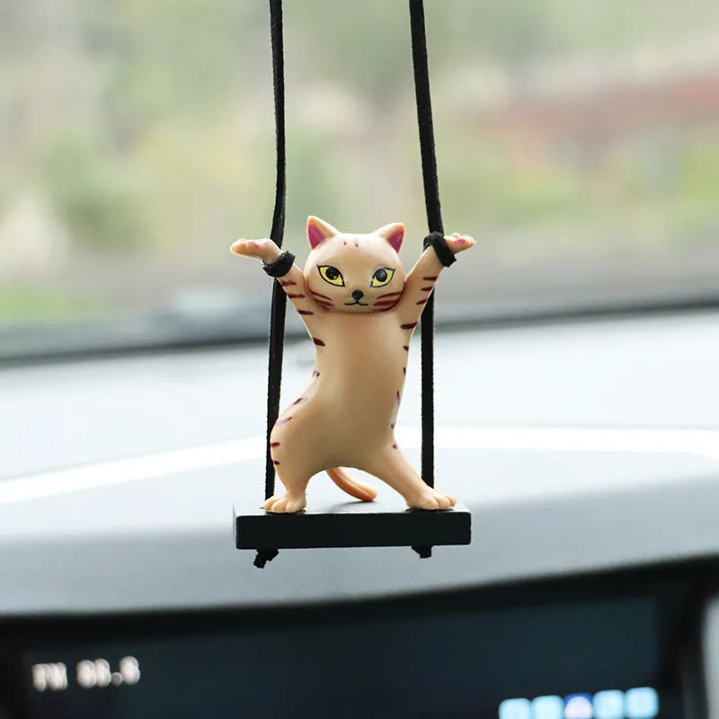 Resin cartoon cat pendant for car interior decoration on a rope, shown in multiple colour options.