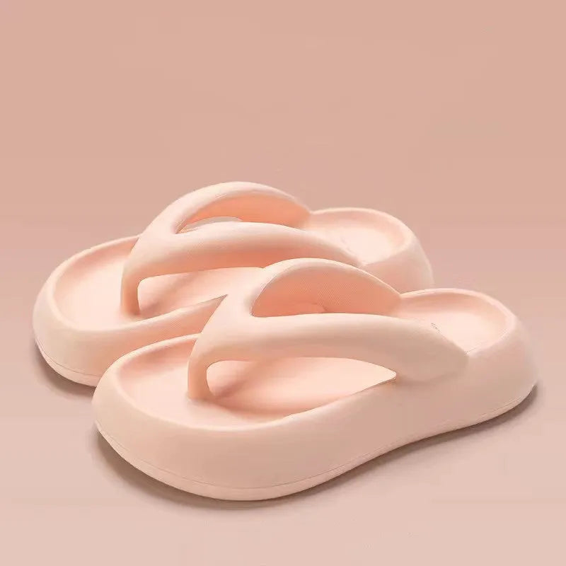 Solid colour women's flip-flops with a thick EVA sole and a small bow on the upper.