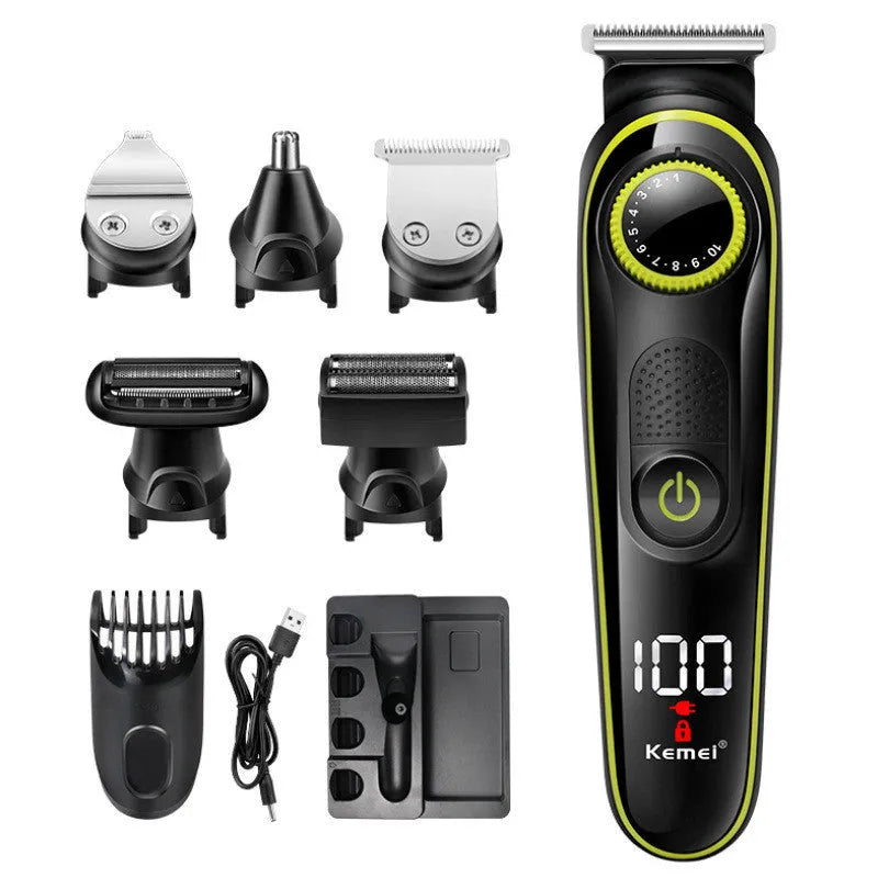 Black household electric hair clipper model KM-696 with USB cable and accessories on a plain background.