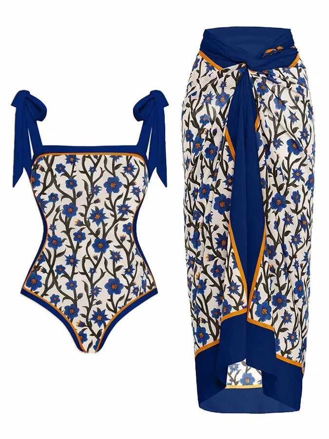 Women's two-piece floral printed swimsuit with matching chiffon-style hip skirt for modest swimming coverage