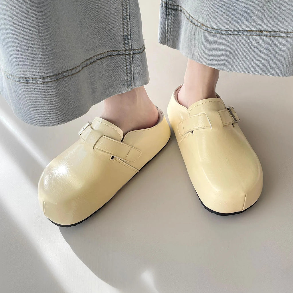 Flat buckle casual sneakers with round toe and PU leather upper in multiple colour options