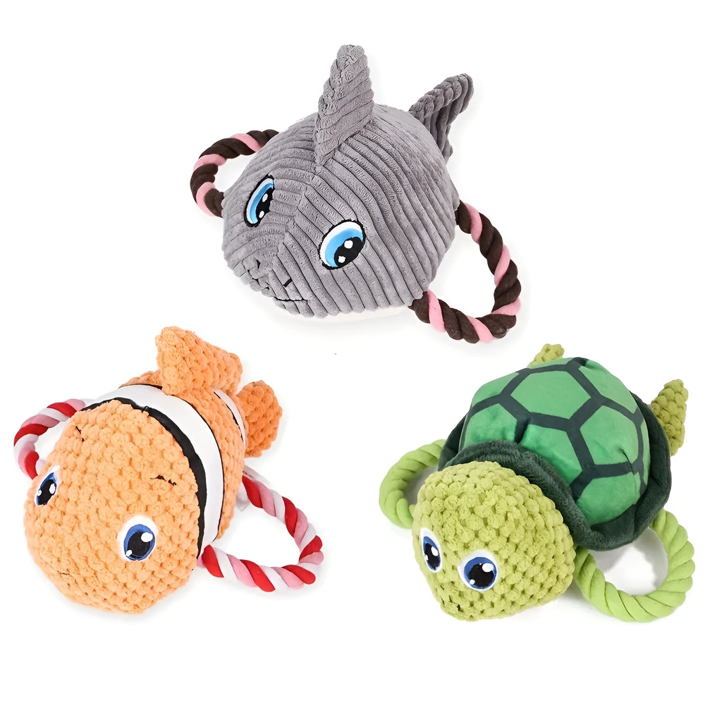 Grey turtle-shaped plush dog toy with knotted rope legs and squeaker