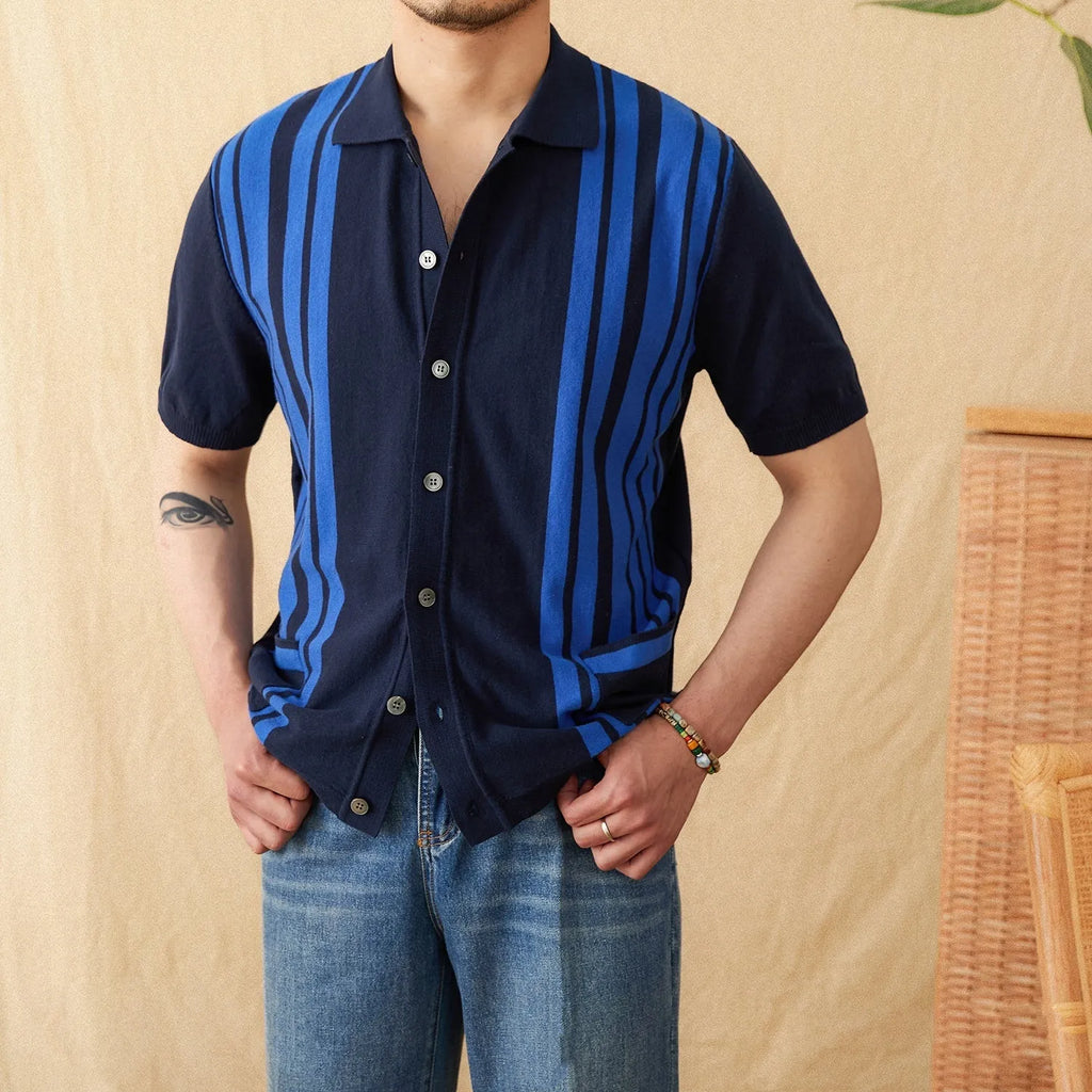 Man wearing a royal blue striped short sleeve polo shirt with a lapel collar.