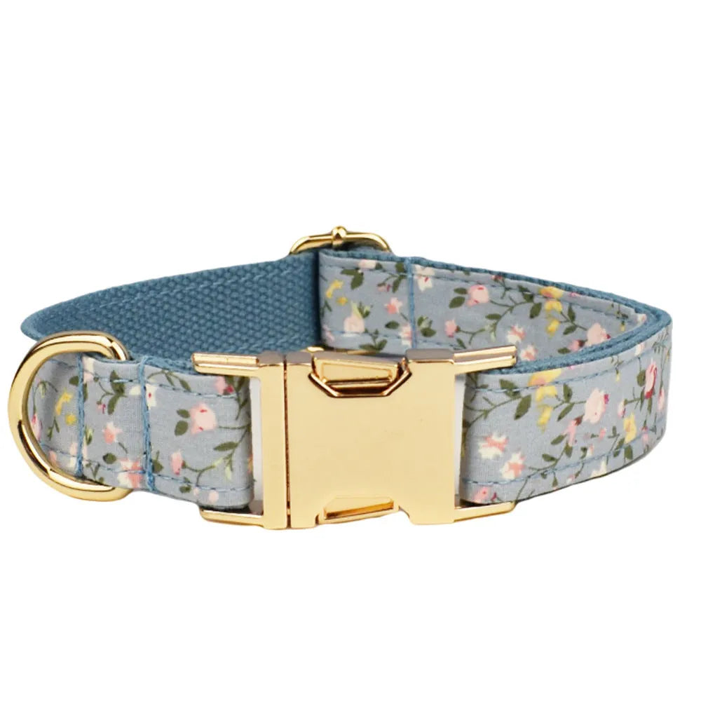 Floral dog collar set with matching leash, vest, and bow accessories in polyester cotton cloth