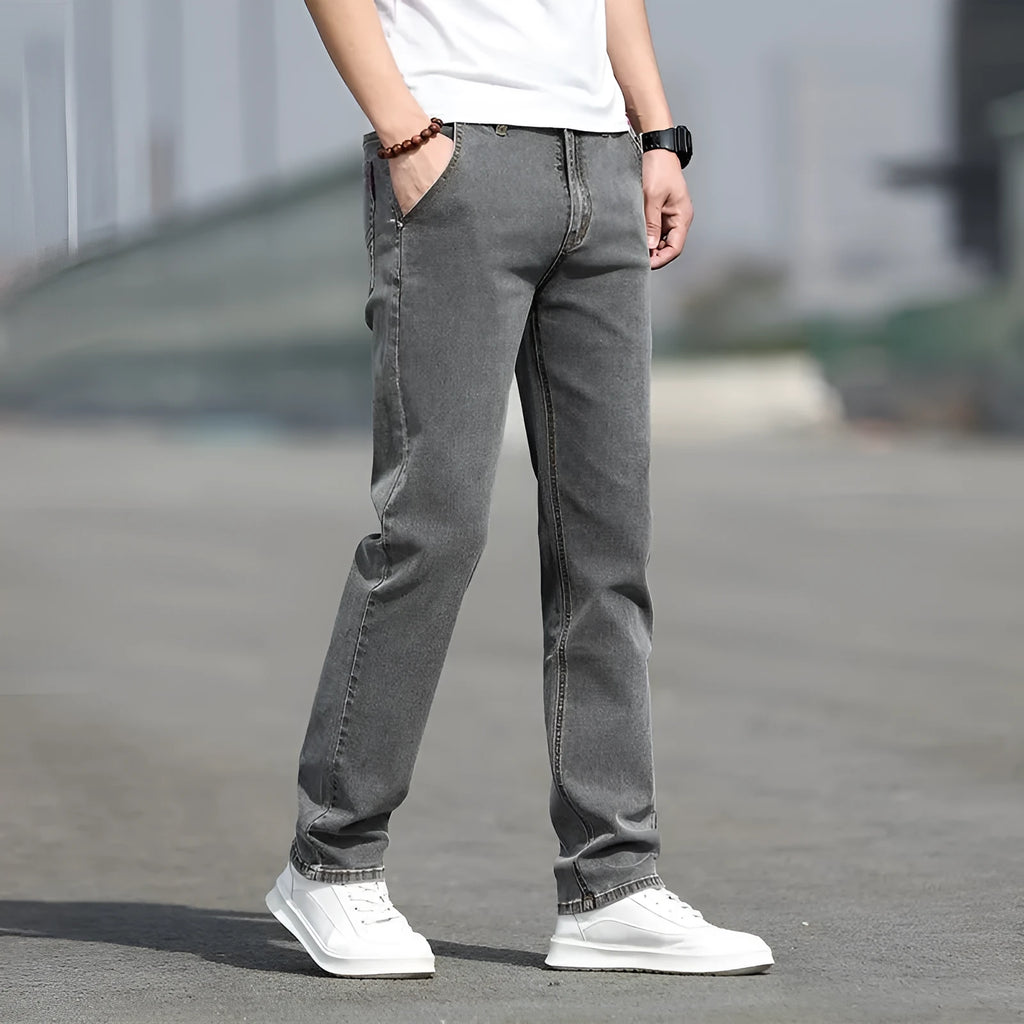 Men's smoky grey straight cut jeans with rabbit fur fabric and zip fly closure