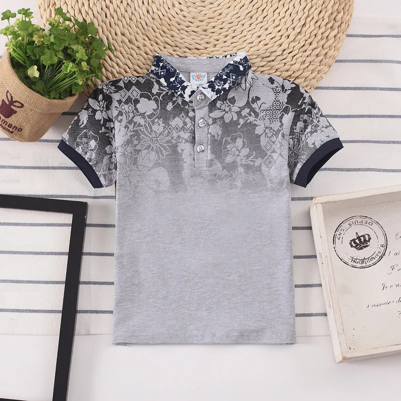 Solid colour short sleeve cotton shirt for a boy on a hanger.