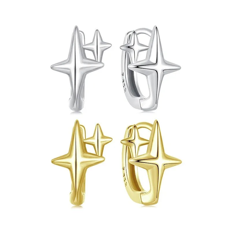 Minimalist star design silver ear clip with XINGX detail on a plain background.