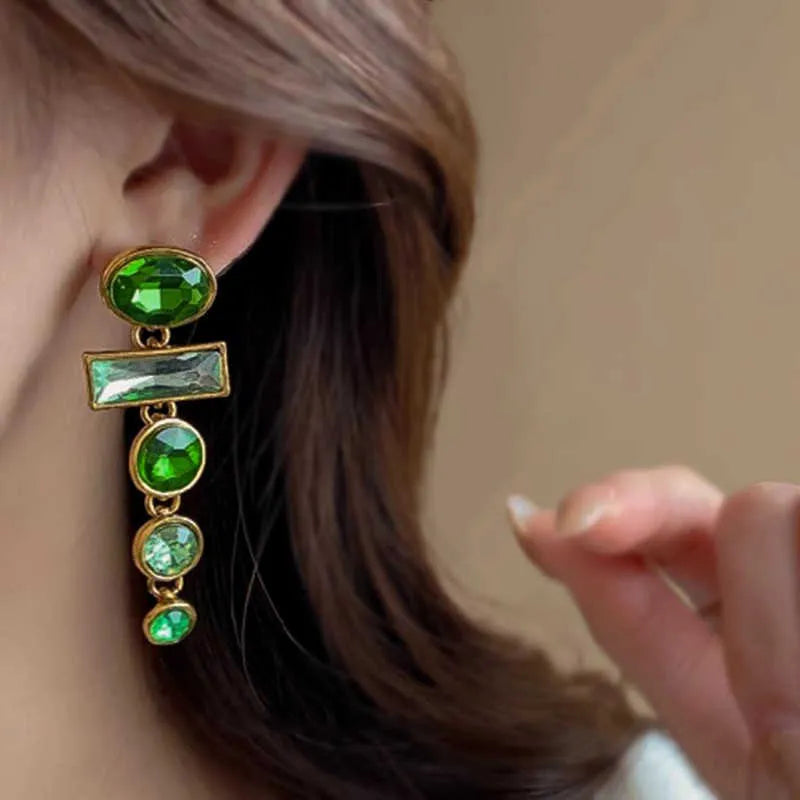Green zircon and gradient tassel geometric alloy earrings in a retro Chinese style.