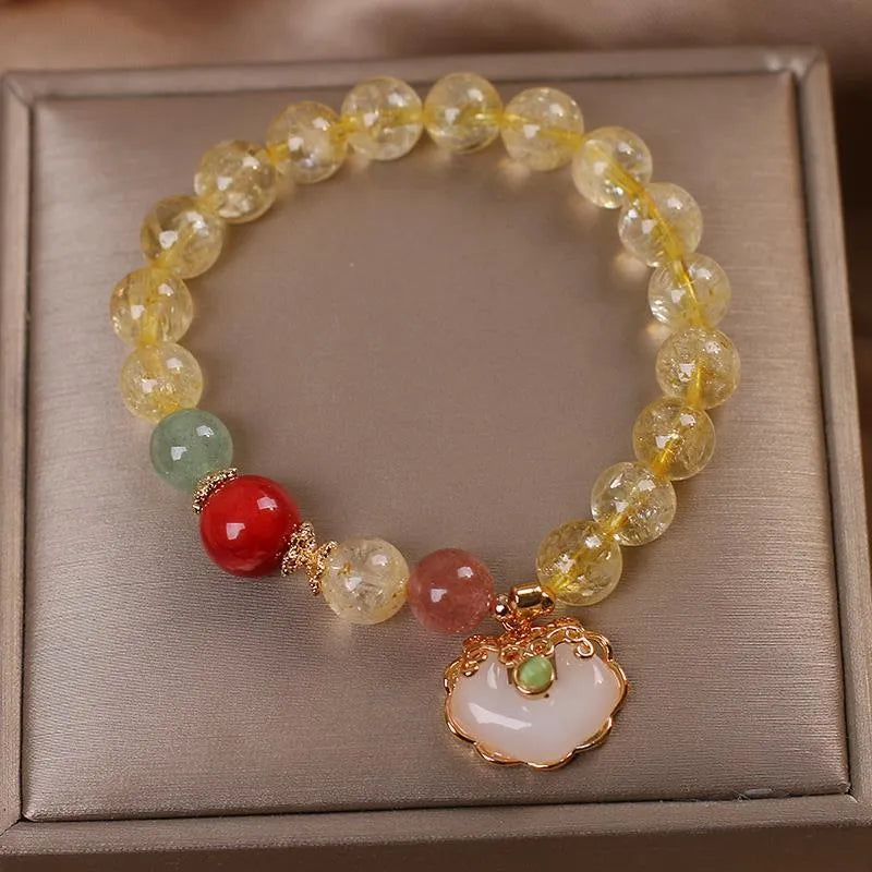 Women's pendant bracelet with natural citrine jade ruyi charm in yellow hair crystal colour
