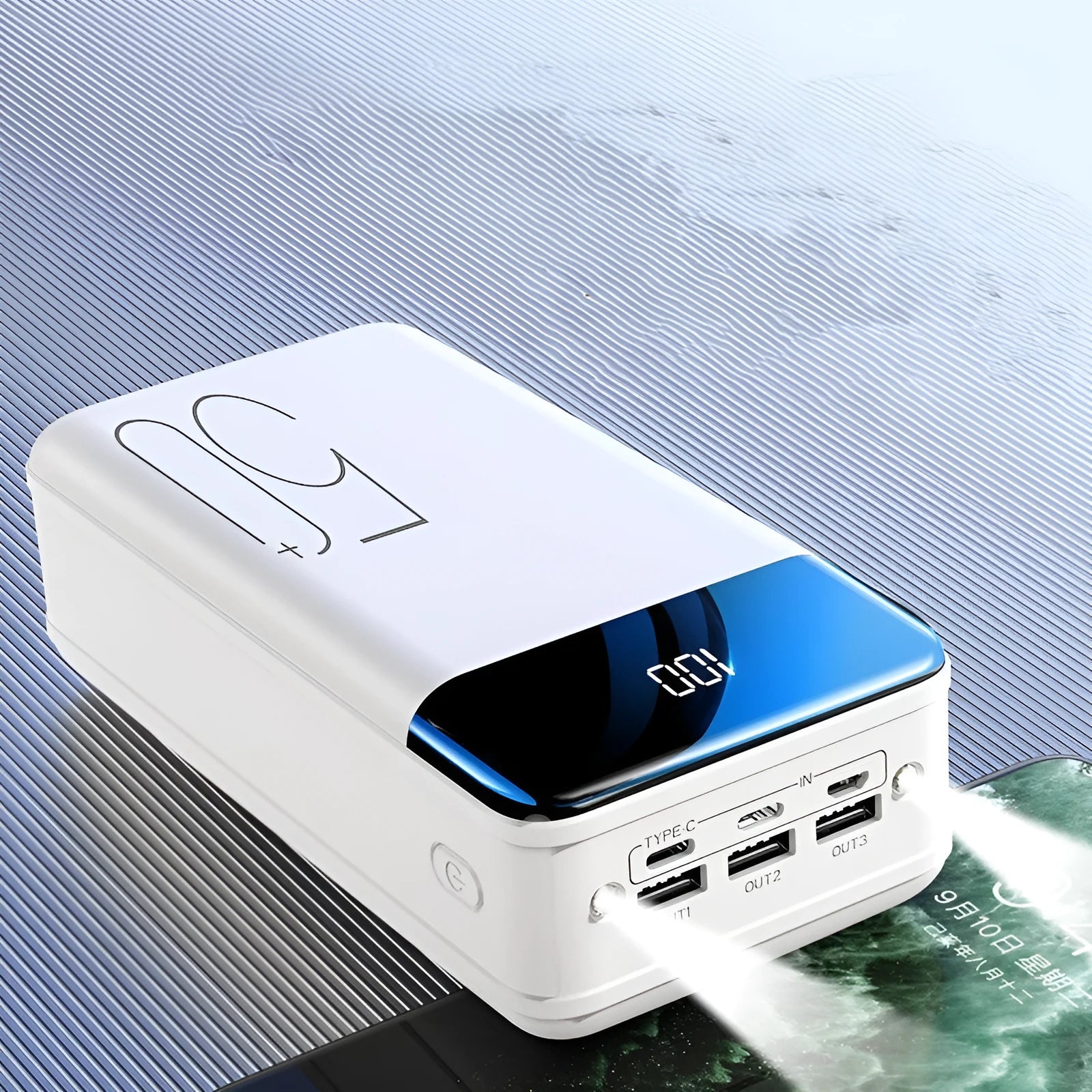 Large black 50000mAh power bank with three USB output ports showing dimensions 169x83x52mm