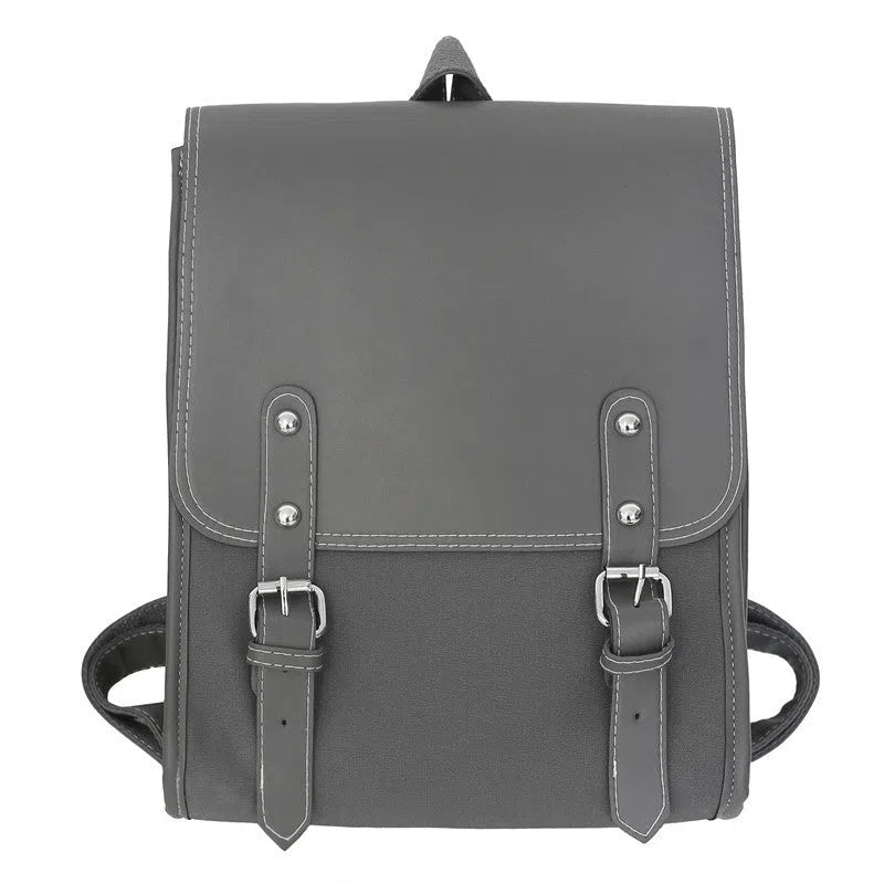 PU leather motorcycle-style buckle laptop backpack with geometric pattern in black, gray, and white, 20-35 litres capacity