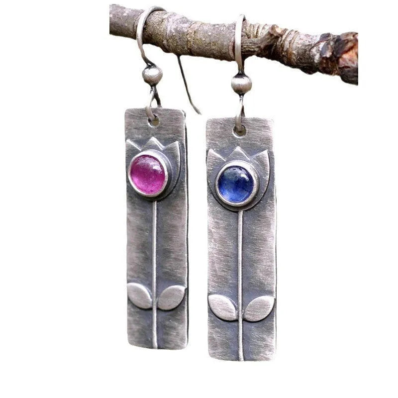 Antique finish geometric earrings with red sapphire stones on electroplated metal