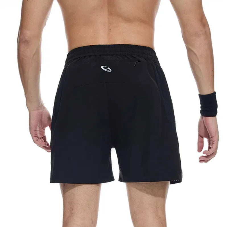Four-point running shorts with laser stitching and stretch fabric in black or blue athletic colours