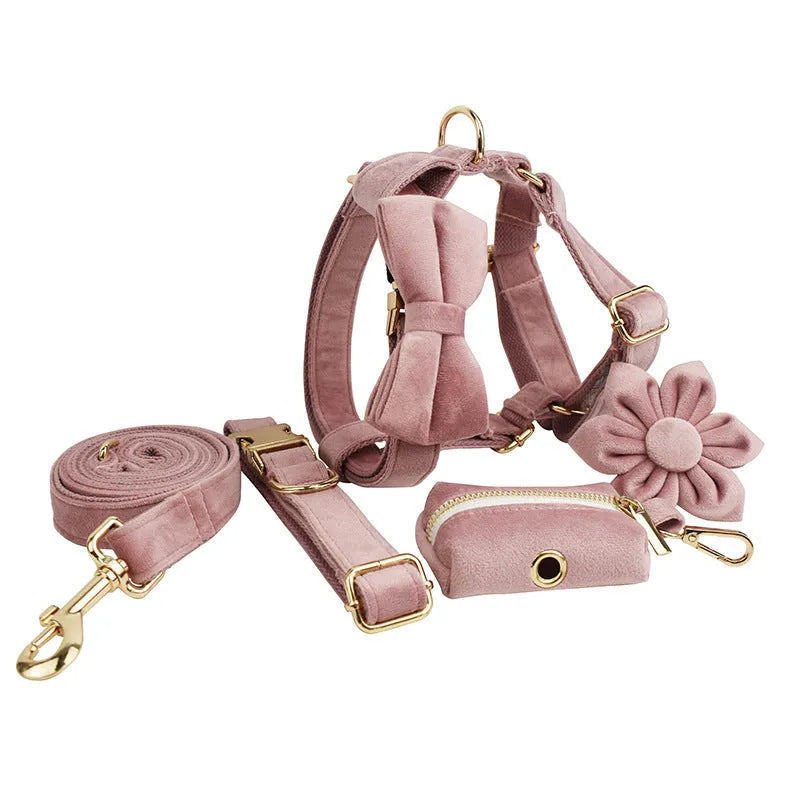 Light purple cloth dog collar set with matching leash, decorative bow, and dog vest