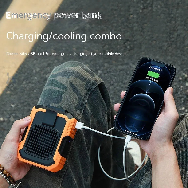 Green wrist-mounted fan with blades, LED light, and USB charging port on a silicone strap.
