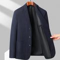 Men's solid colour loose fit woolen coat for casual spring and autumn wear.