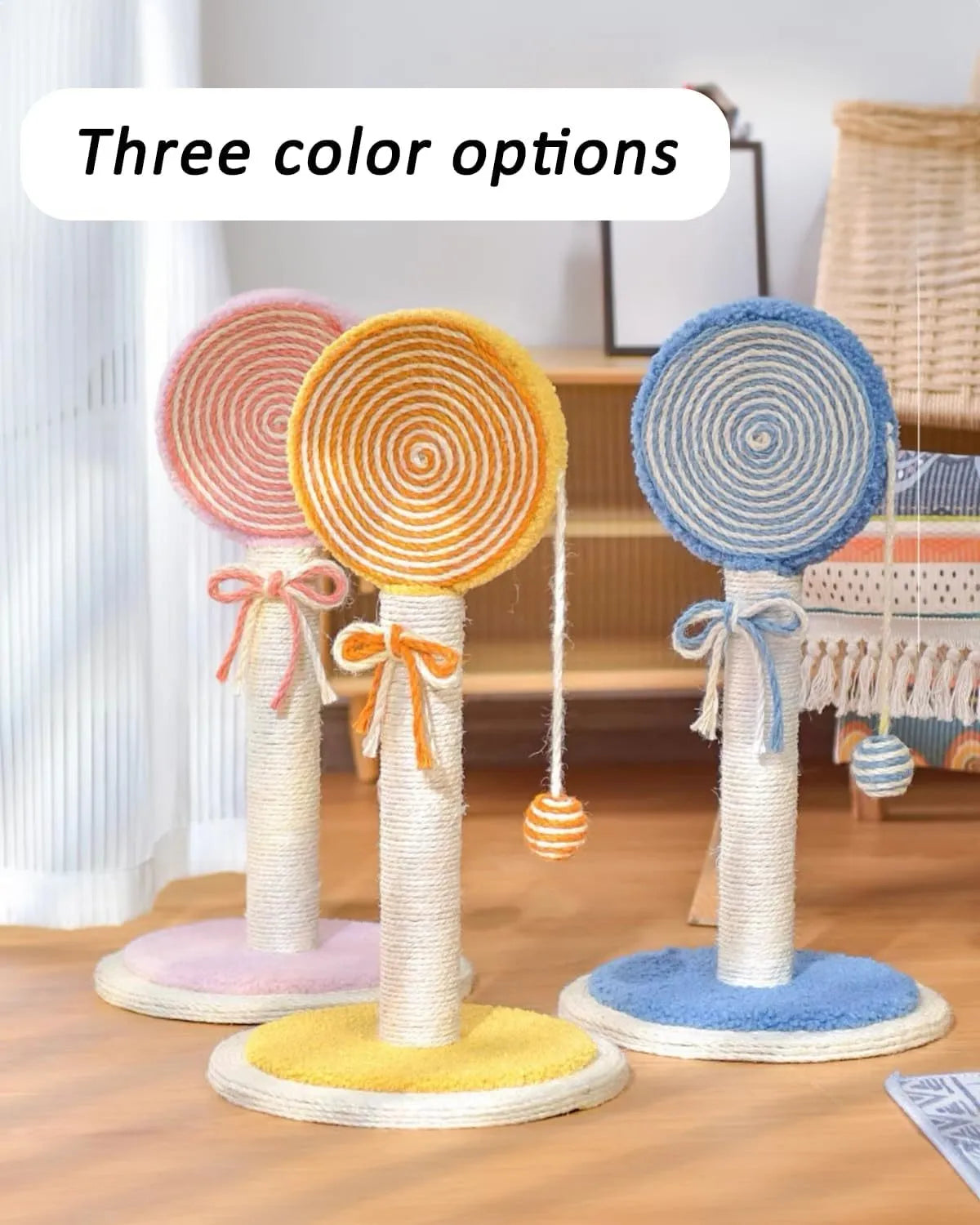 Blue cat scratching post made of natural sisal rope with a hanging ball toy on a sturdy wooden base.