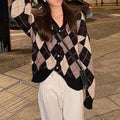 Acrylic knitted casual cardigan coat in macaron colours including pink, green, black, khaki, with regular sleeves.