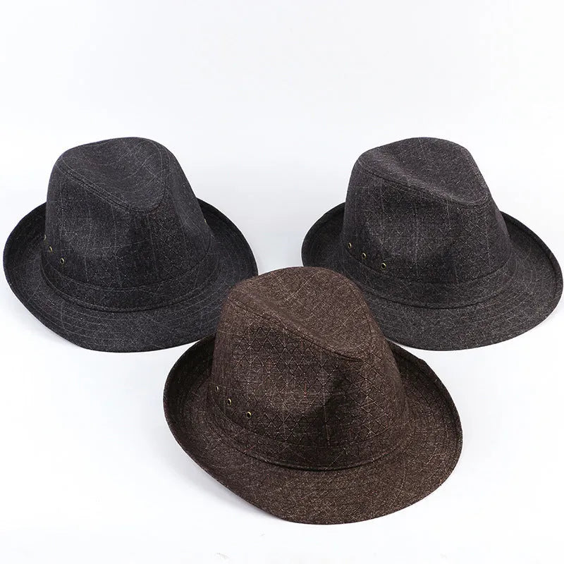 Classic brown suit material fedora hat for men on a grey background.