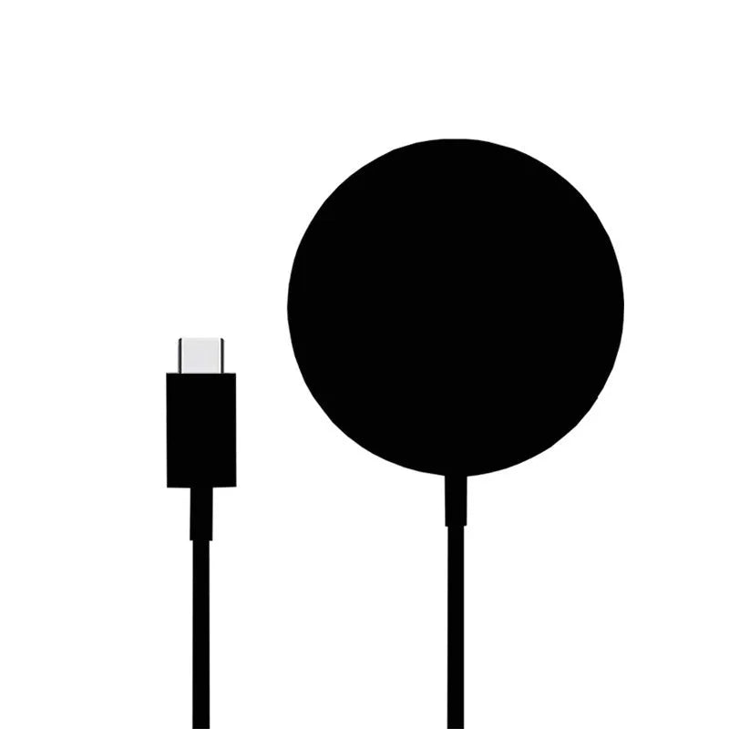 15W magnetic wireless charger with USB-C input, black finish, on a white desk, 84mm diameter disc with magnetic phone alignment