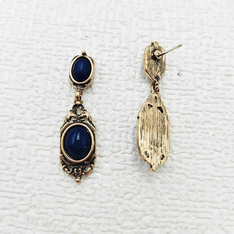 Retro Chinese style alloy earring pair with electroplated silver finish showing silver needle and triangle ear clip options