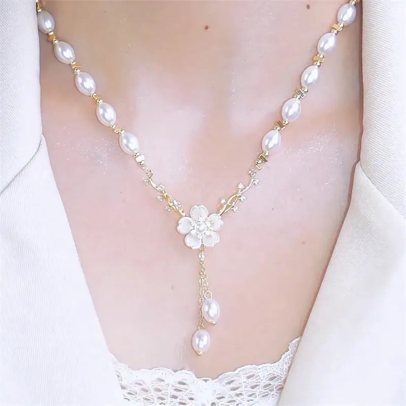 Alloy pearl chain necklace with floral and rose decorative elements in pearl flower colour