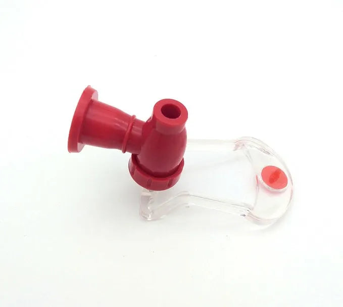 Red plastic Magic Tap soda dispenser attachment for 2-litre bottles